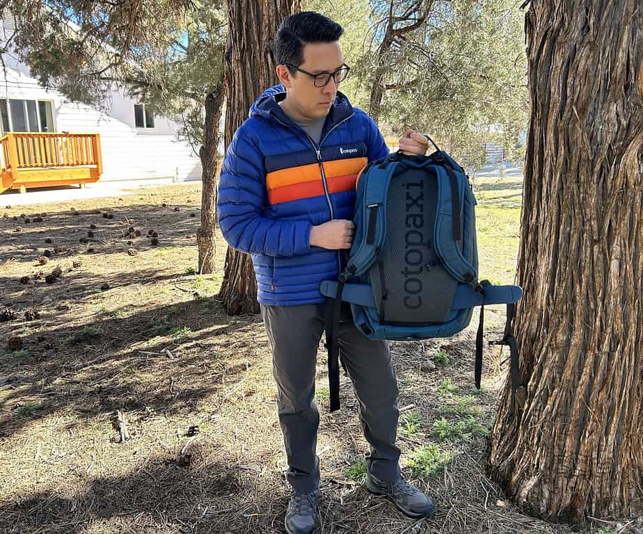 hiker showing mesh backpanel of backpack